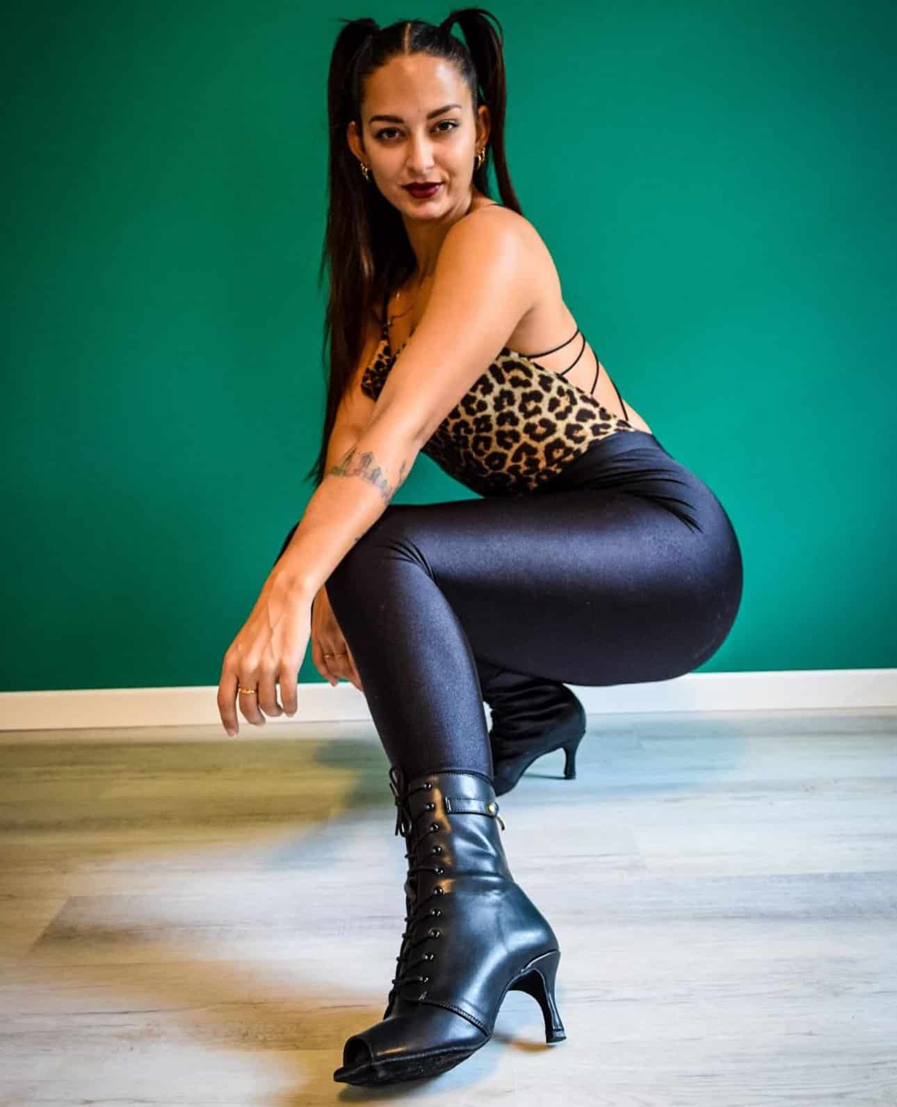 Chiara bachatera wearing Black mid heel stilettos